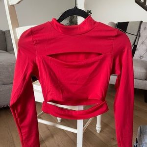 Red cut out long sleeve crop top